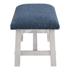 Banc Callen de OS Home and Office Furniture, avec structure blanchie et garniture cloutée bronze antique, revêtu de tissu bleu marine.