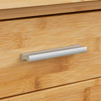 Armoire à linge basse en bambou et verre, style simple.