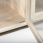 Buffet Arelius en bois massif blond avec piètement en fer doré et portes vitrées - 70 cm (L) x 32 cm (H) x 18,75 cm (P)