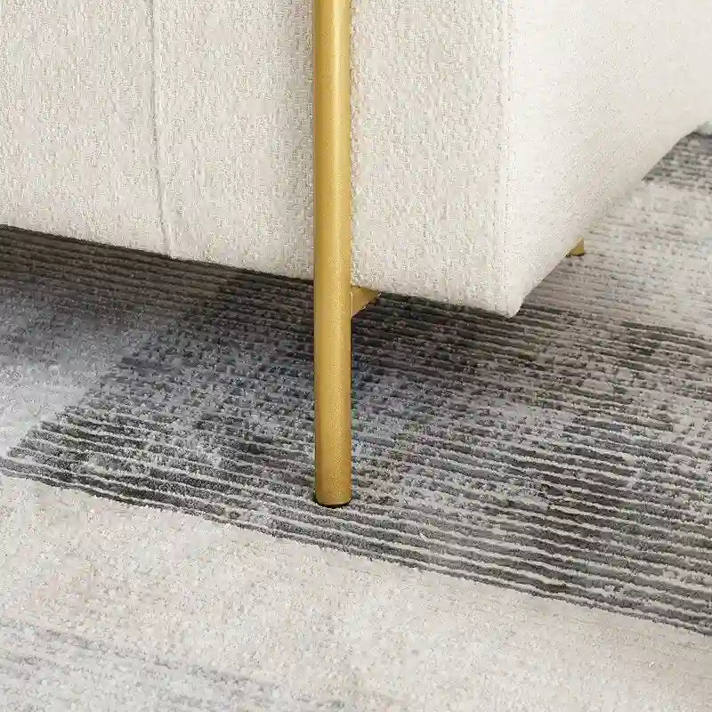 Pouf coffre rembourré en velours moderne, élégant repose-pieds avec accoudoirs arrondis et pieds en fer pour chambre ou entrée.